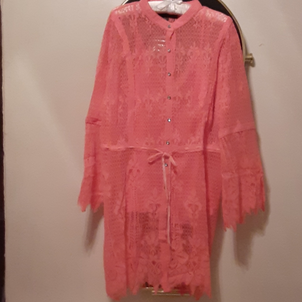 It's a coral lace blouse